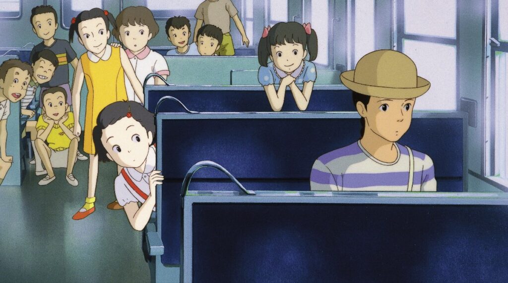only-yesterday-1 - junglecity.com A girl peeks from behind a bus seat while a boy with a hat sits at the front; other children sit and stand in the background on the school bus.