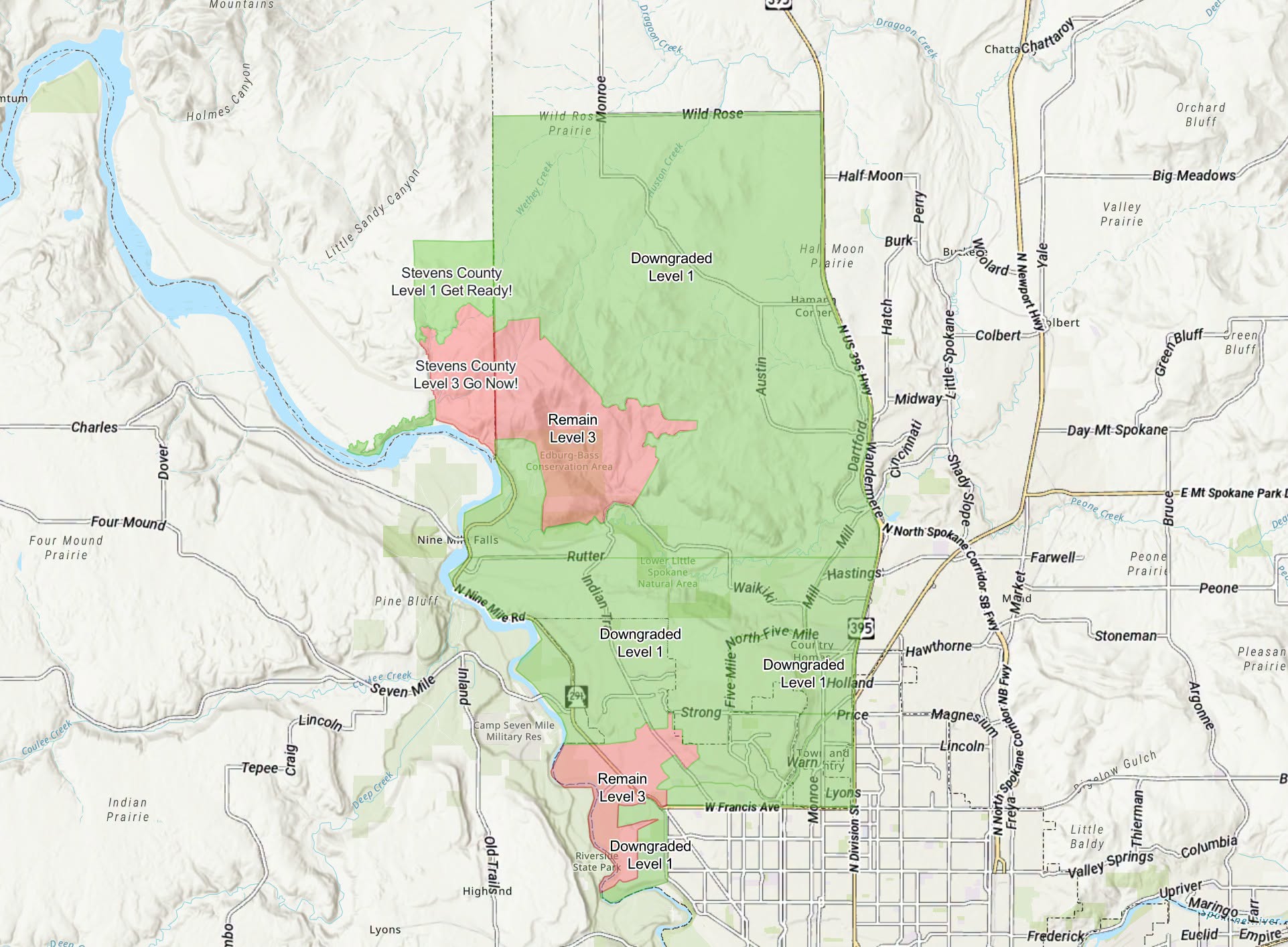 Map of Stevens County with color-coded emergency levels: green Downgraded Level 1, pink Remain Level 3, and green Get Ready Level 1 areas marked on the map.